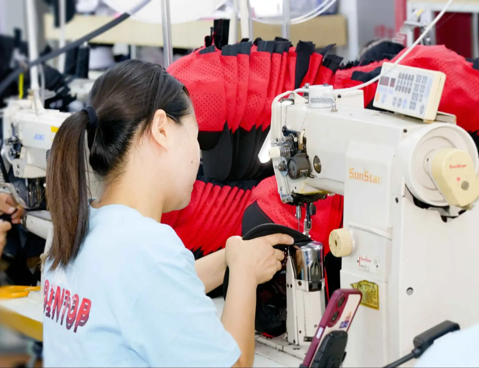 Operator topstitching red perforated performance cap crowns