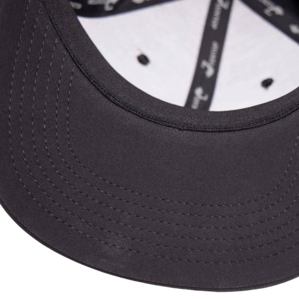 Inside of a black cap visor showing parallel stitch rows