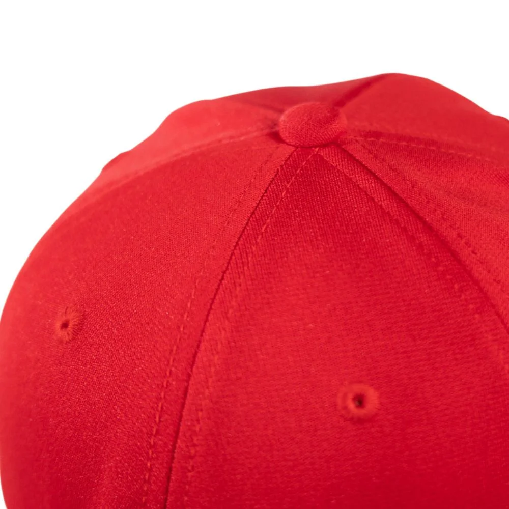 Close view of red cap crown seams and topstitching