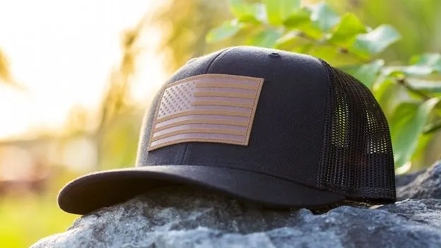 Black mesh cap with leather American flag patch