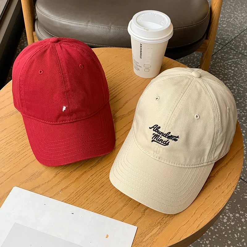 Red and beige caps with coffee