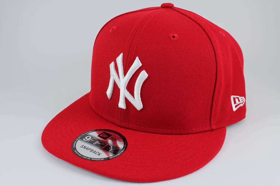 Red Yankees snapback with white NY logo and New Era branding