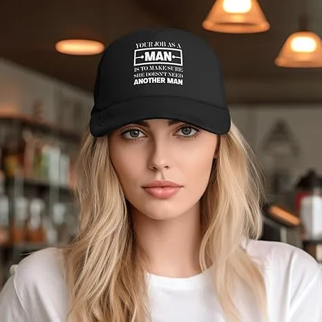 Woman in black cap with bold text in a warmly lit cafe