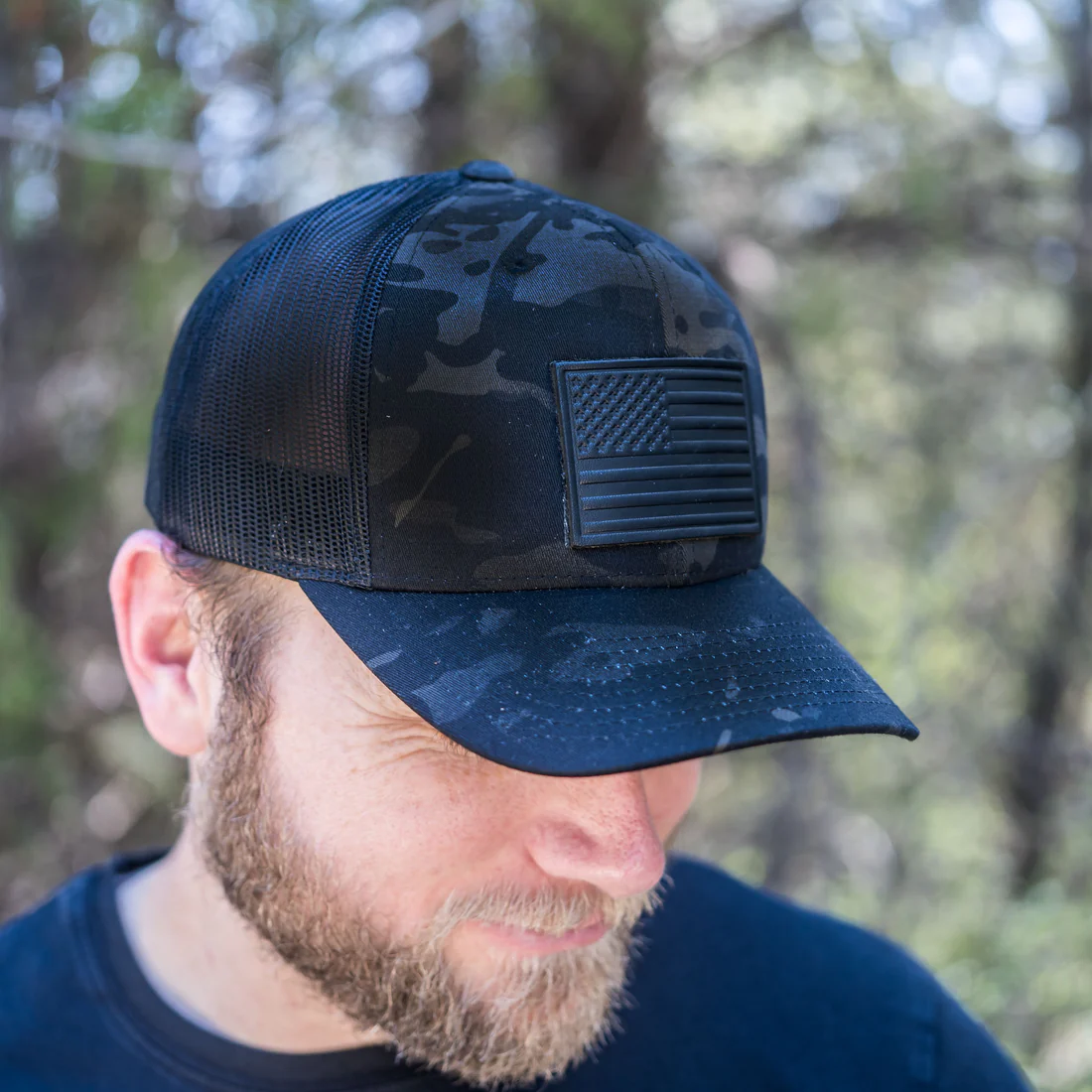 Person in Sublime Doughnuts trucker hat urban background