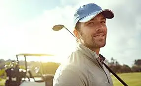 a man with golf hats