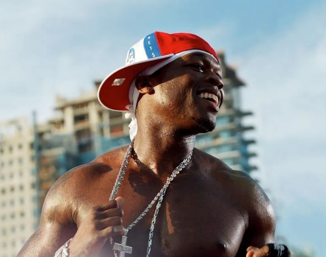 black hip hop man with his snackback hat