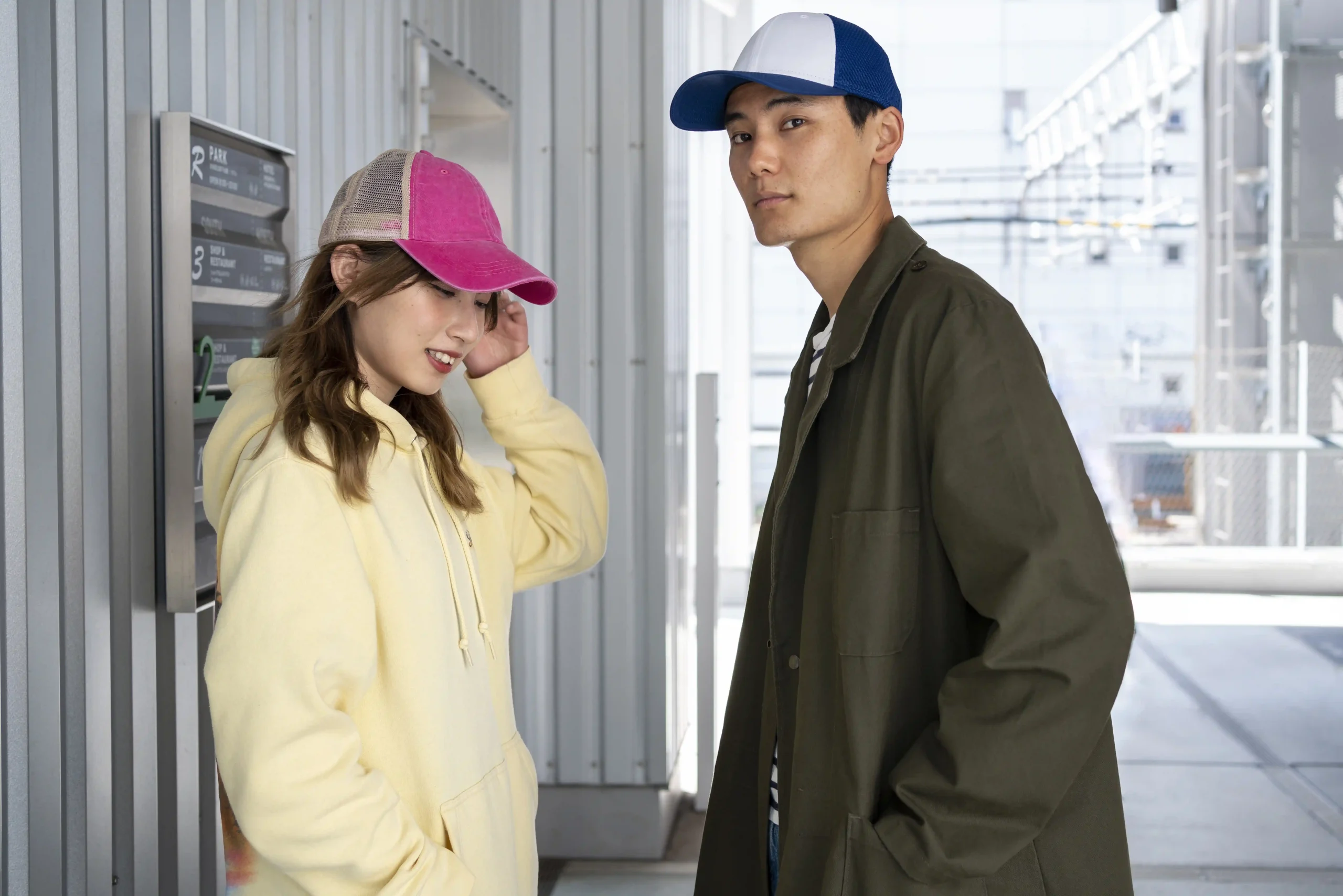 friends smiling with Moisture Wicking hats