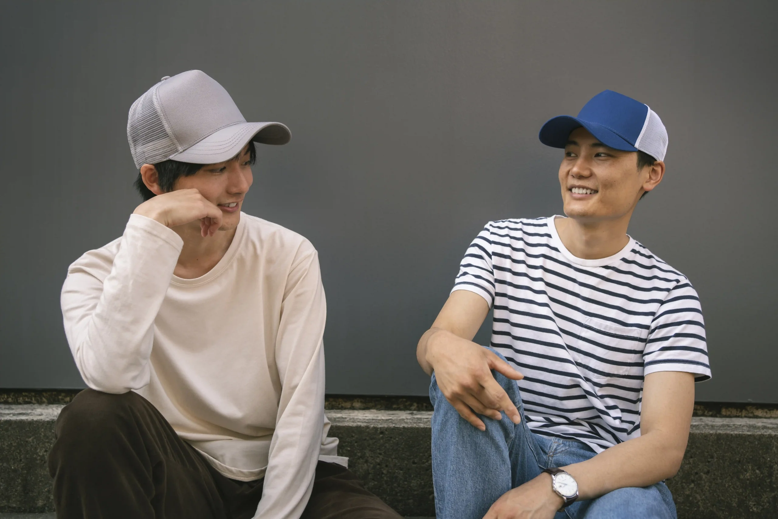 medium shot smiley friends with trucker hats medium shot smiley friends with trucker hats