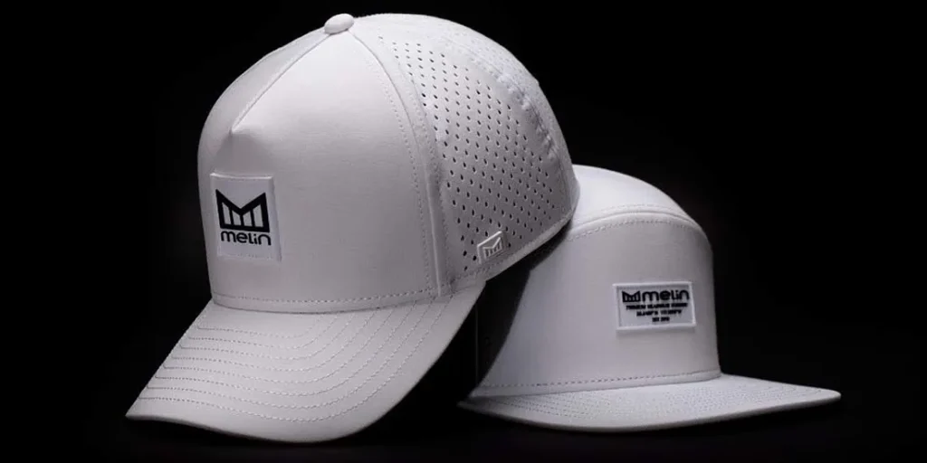 Two white Melin hats with ventilation