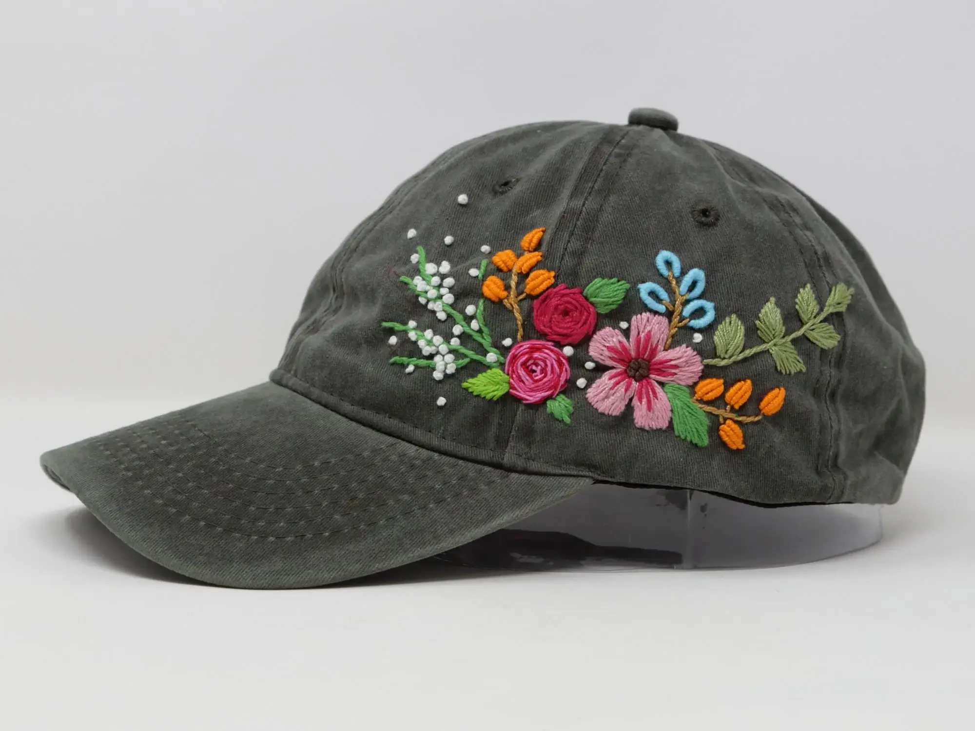 Dark gray embroidered cap with pink and orange flowers Dark gray embroidered cap with pink and orange flowers
