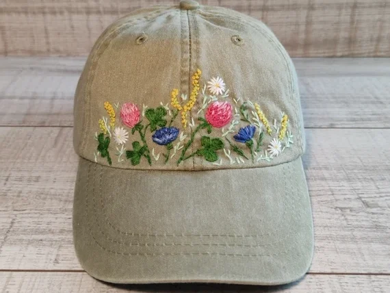 Light brown embroidered cap with wildflower design Light brown embroidered cap with wildflower design
